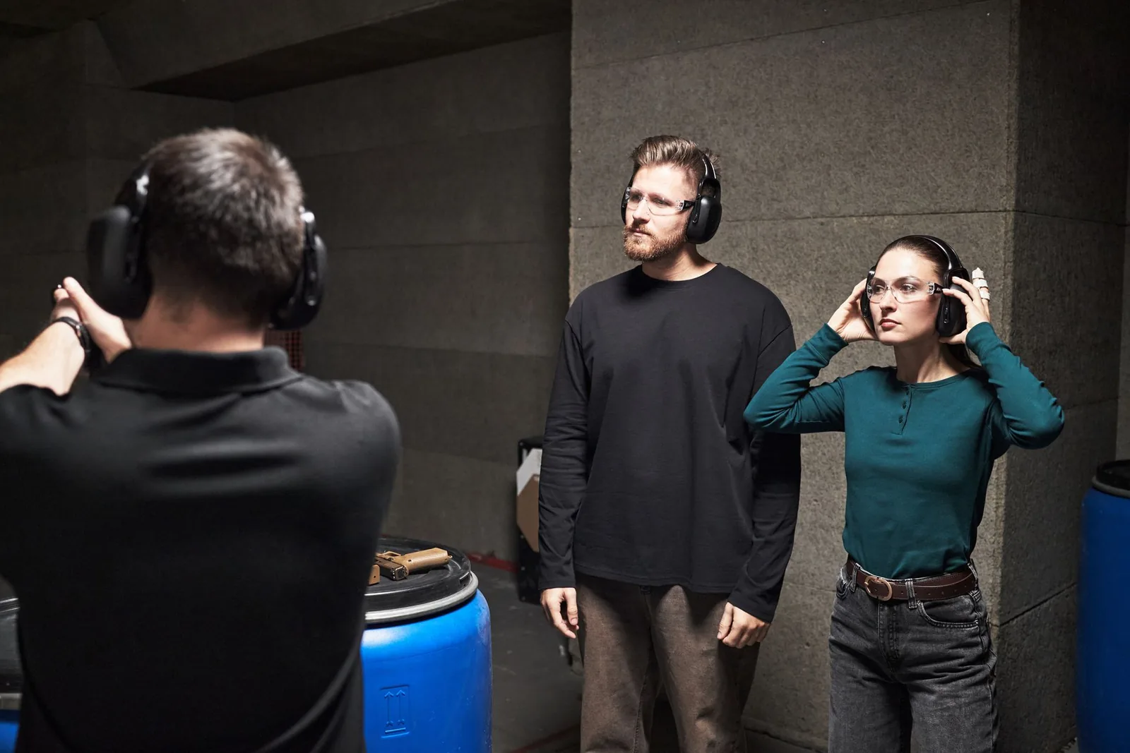 Students fitting hearing protection before range time